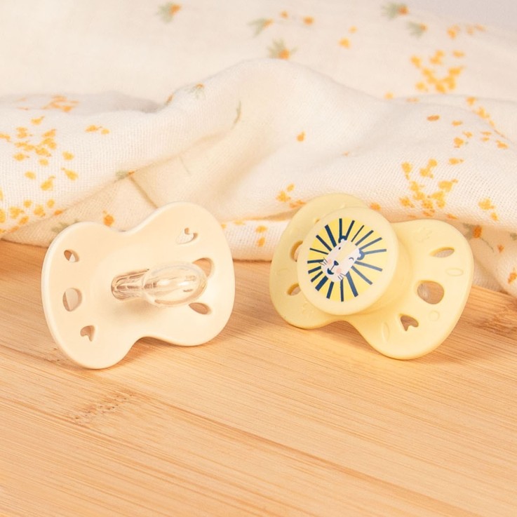 Sucette anatomique blanc et jaune