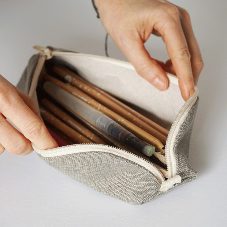 La trousse zippée en lin