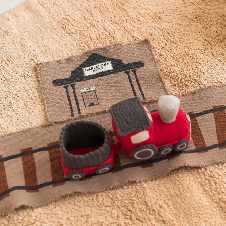 Peluche et tapis de jeu enroulable Ride & Roll en coton