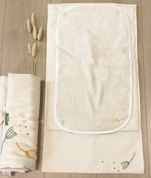 Tapis à langer nomade en...